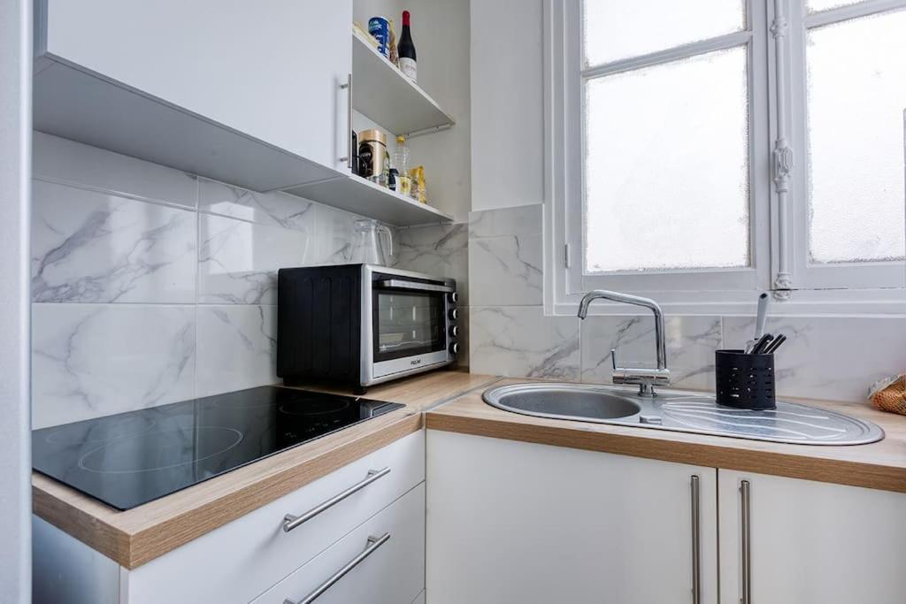 Nice Flat With Billard And View Paris Bagian luar foto
